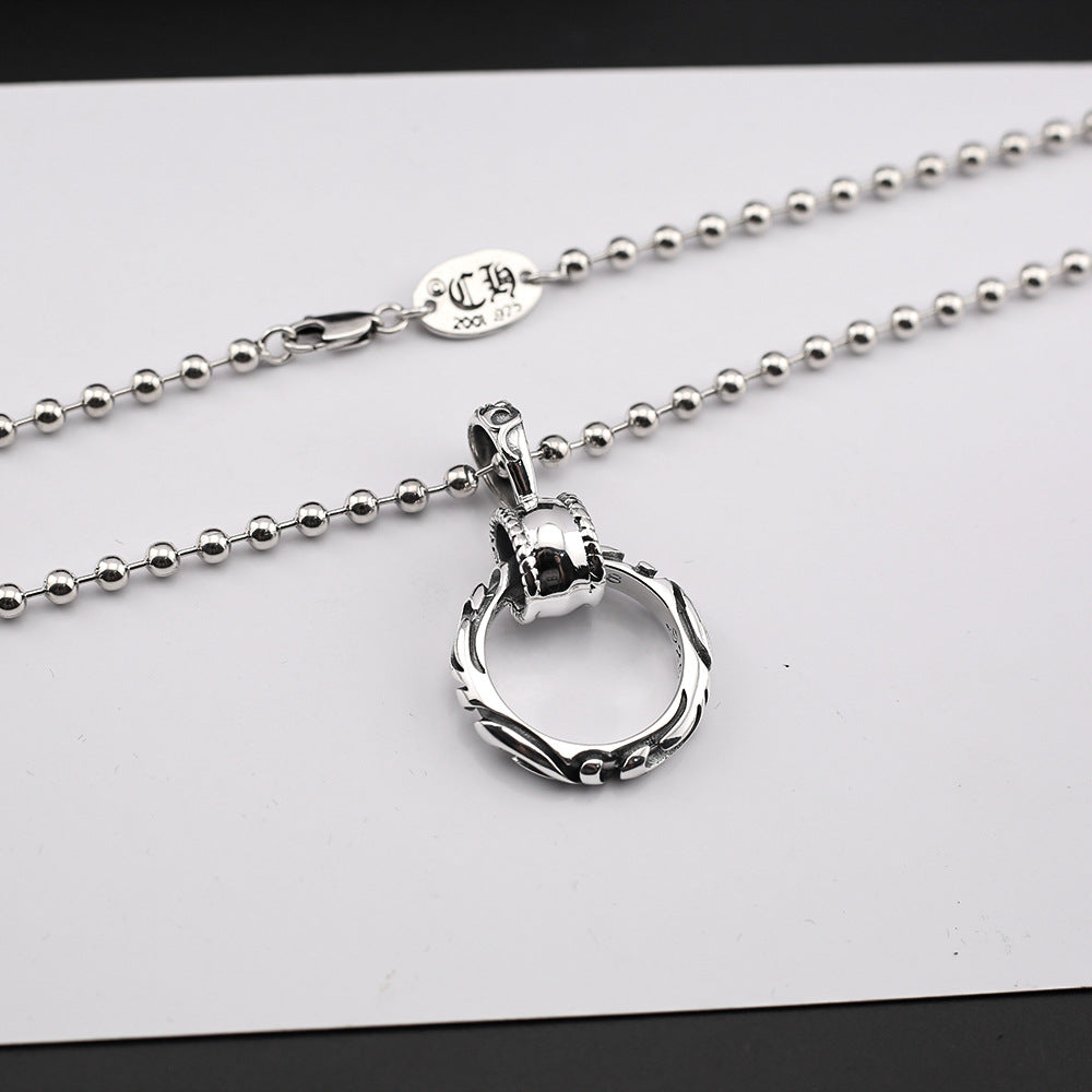 Chrome Hearts patterned ring pendant necklace